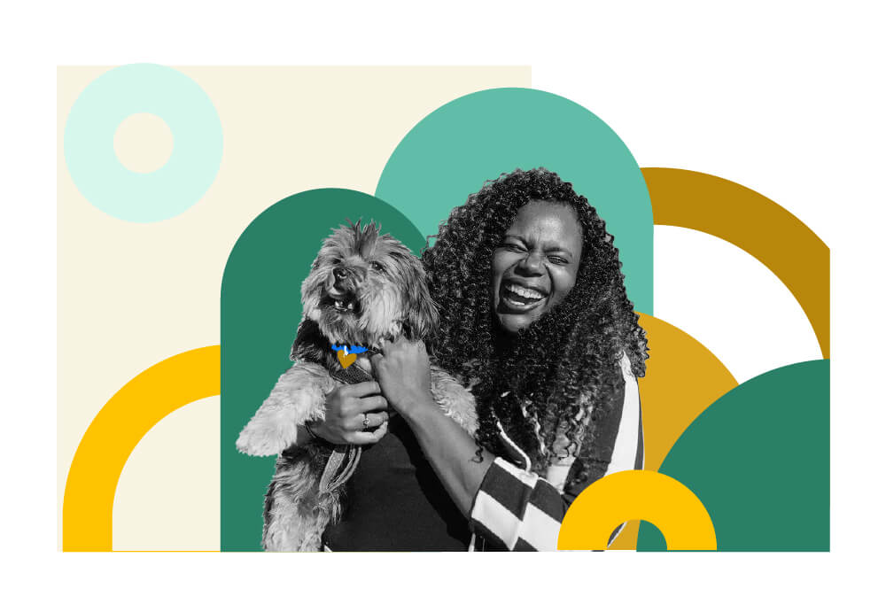 Shenee laughing with her pup