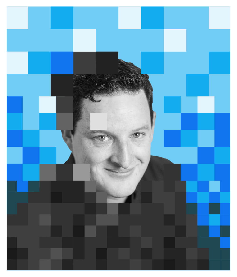 Mat Patterson surrounded by blue pixels